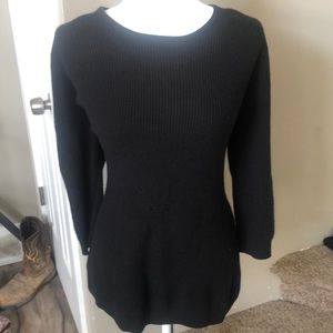 Sweater tunic top with tie down the back.